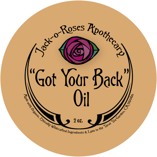 Round front label for Jack-o-Roses Apothecary 'Got Your Back' Oil, 2 oz bottle, featuring a stylized rose icon and black decorative text on a tan background.