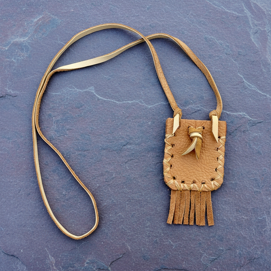 Mojo Hand Pouch Tan Leather on gray slate